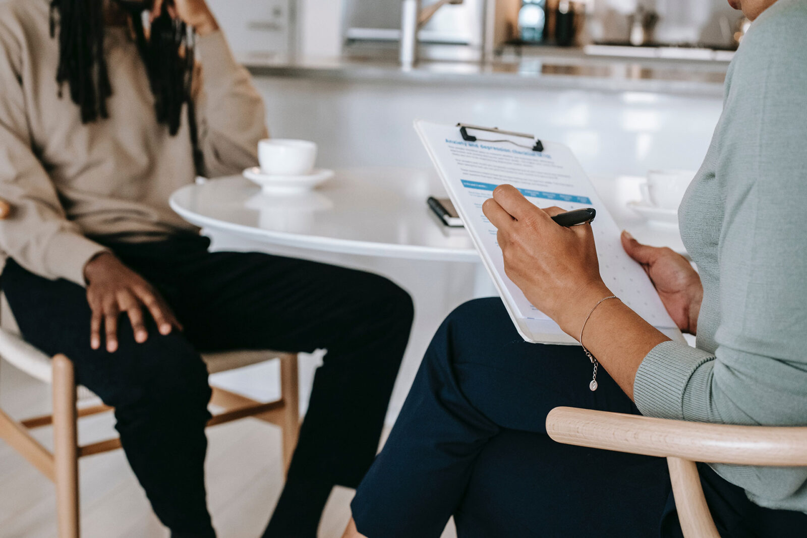 Hiring manager speaking with prospect employee